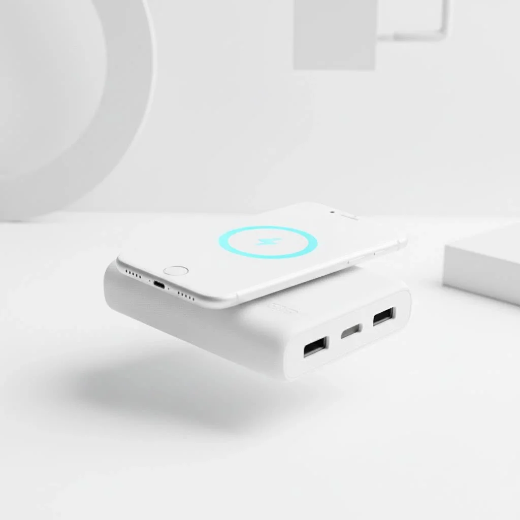 Compact power bank charging a smartphone